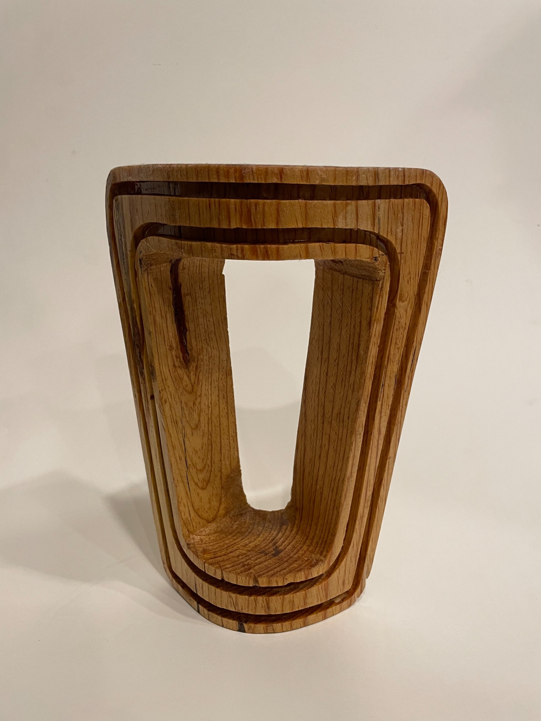 Quarter-scale wooden model of the Fren lamp, stacked laminations showing the tapered archway profile